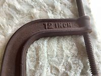 Close-up of 12-inch marking on larger clamp arm