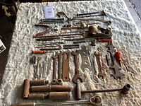 Full layout of all vintage hand tools on table
