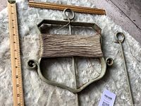 Twine holder with twine and one stake beside ruler