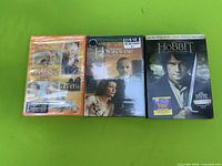 Front view of all three sealed movie cases