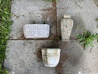 three planters grouped showing shapes and wear
