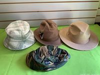 All four hats group shot
