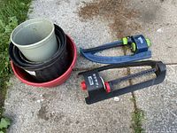 All four pots and two sprinklers on concrete