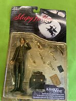 Front of sealed Sleepy Hollow Ichabod Crane action figure with accessories visible