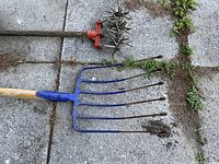 Pitchfork head and cultivator head close-up
