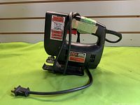 Left side view of Skil 4235 jigsaw showing model label and power cord