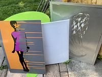 All three items leaning together showing relative sizes and finishes