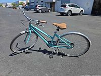 Full left-side view of Felt Cafe 3 bicycle showing overall condition and components