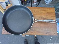 Full view of 12-inch frying pan on wood surface