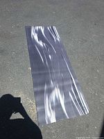 Full view of top surface of yoga mat laid flat