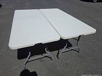 Both tables set up side by side showing tops