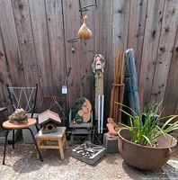 Group shot of garden items against fence