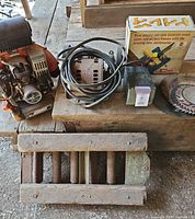 Group shot showing Echo blower, Jointmaster box, electric motor/transformer, saw blades, conveyor section