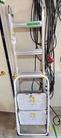 Ladder folded with step stool nested in front