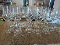 Front view showing majority of wine glasses grouped together