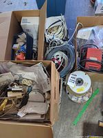 Boxes with spools of wire, outlet plates, connectors