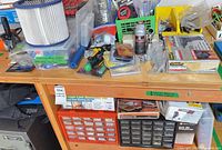 Workbench surface with organizers, filter, Stanley accessory box, hardware cabinets