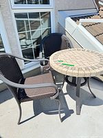 Table with two chairs to show complete set