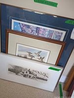 All three framed prints stacked for overall view