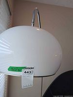 White glass dome shade with chrome support arm