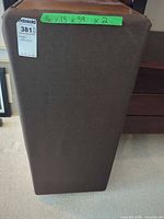 Front view of one speaker with grille cloth