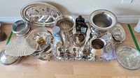 All items grouped on floor, showing major serveware pieces and accessories
