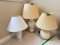 All three lamps grouped together showing overall condition