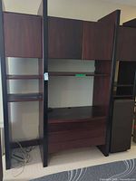 Full frontal view showing overall structure, cabinets, shelves and drawers