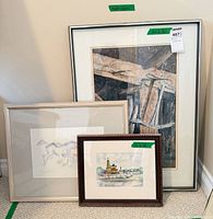 Front view of all three framed artworks showing sizes and subjects