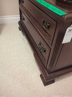 front view showing two drawers and hardware