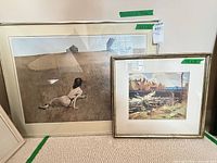 Both framed prints side by side showing relative sizes and mats