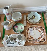 All items grouped on floor showing quantity and variety