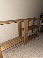 Smaller wood shelving unit with three shelves