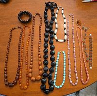All jewelry items laid out on table