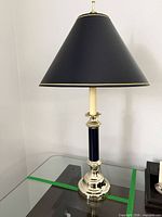 Full view of lamp unlit on glass table