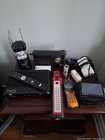 All listed electronic items grouped on tabletop