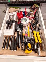 Entire drawer view showing majority of utensils