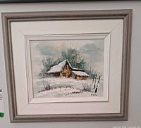 Framed painting on wall showing entire piece