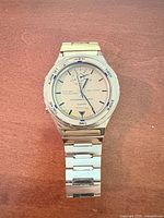 Front view of Pulsar stainless steel analog-digital wristwatch showing dial, bezel text and bracelet
