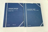 Front covers of two Whitman Canadian coin albums, Quarters 1911–1952 Number Two and Dimes No.2 1937–Date, showing overall wear and design