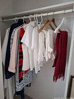Closet rod showing majority of garments on hangers