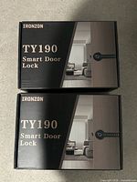 Two IRONZON TY190 smart door lock boxes