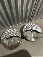 Both brushed nickel fixtures together showing overall design and quantity