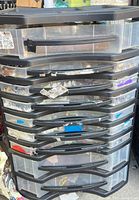 Full view of nine-drawer organizer showing stacked clear drawers