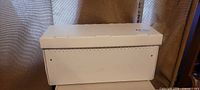 Overall view of the white EZ Nuc box closed