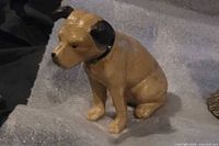 Front view of cast iron dog bank