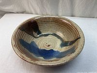 Top view showing cobalt blue and brown glaze, ribbed texture