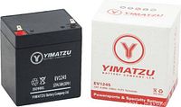 Battery beside retail box showing branding and model