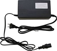 Top view of charger with attached and detachable cords