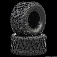 Two IronHorn tires stacked and freestanding showing tread and sidewall